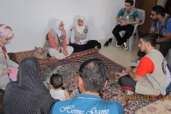 Volunteers Meet with Families